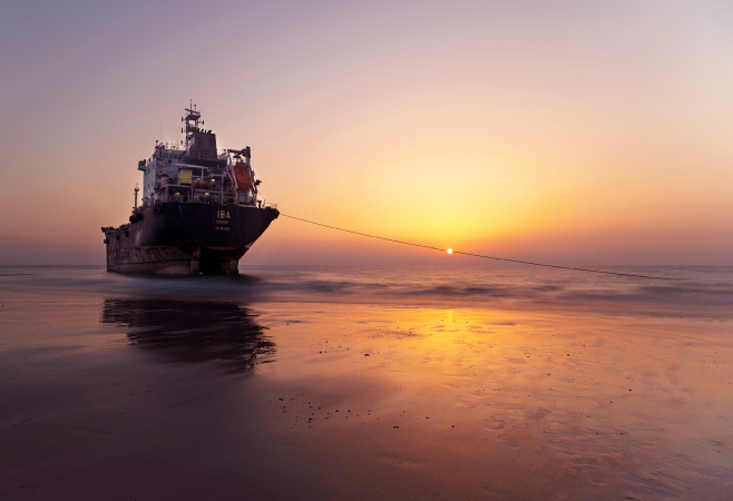 View of the large Panama container ship at the shores of the Umm Al Quwain beach
