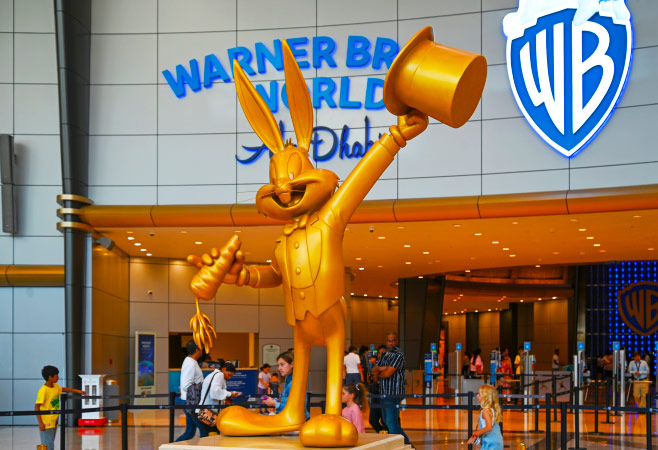 Bugs Bunny and logotype of Warner Bros in WB World theme park in Abu Dhabi