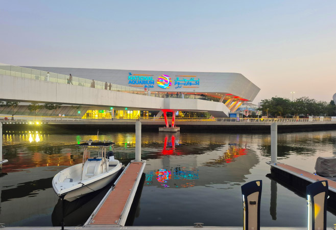 Small boats tighten at the marina opposite of the National Aquarium at Al Qana